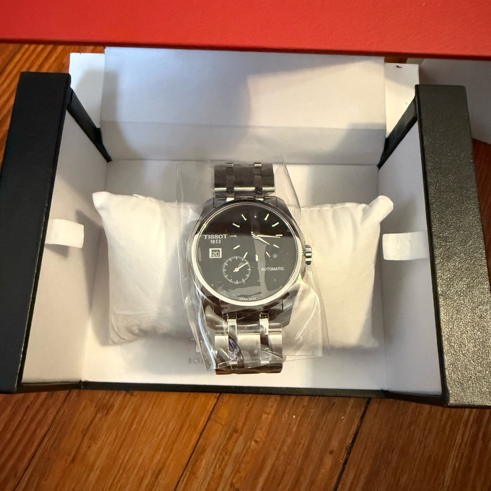 New in box authentic Tissot Classic Black and Silver Automatic Men’s 38MM Watch